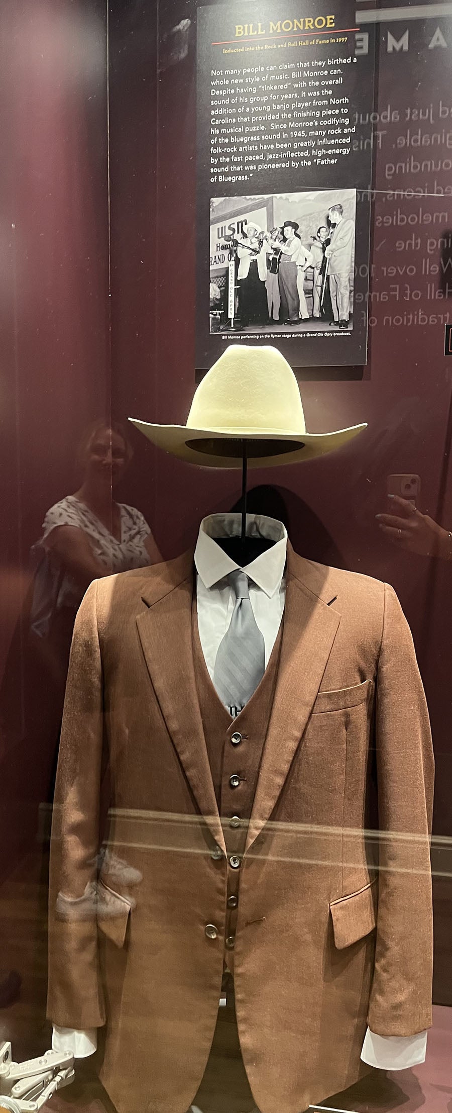 Hat and suit belonging to Bill Monroe on display at Ryman Auditorium.
