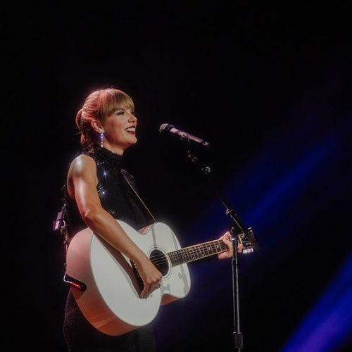 Photo of Taylor Swift on the stage of the Ryman