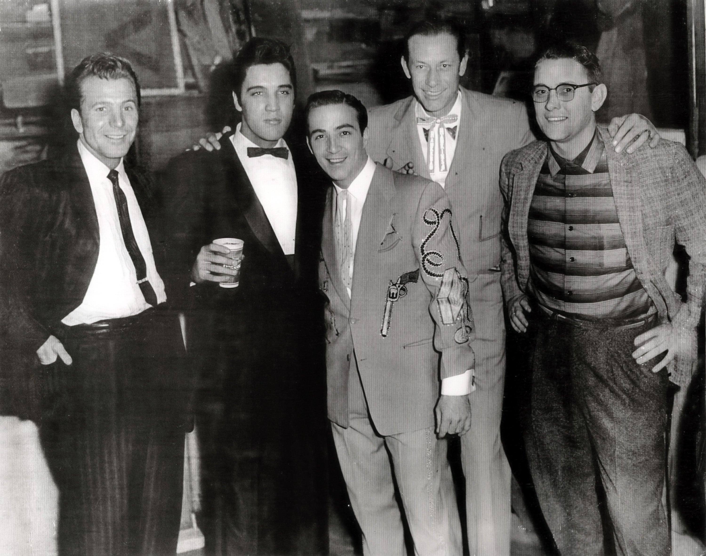 Photo of Elvis with friends backstage at the Ryman for the Grand Ole Opry