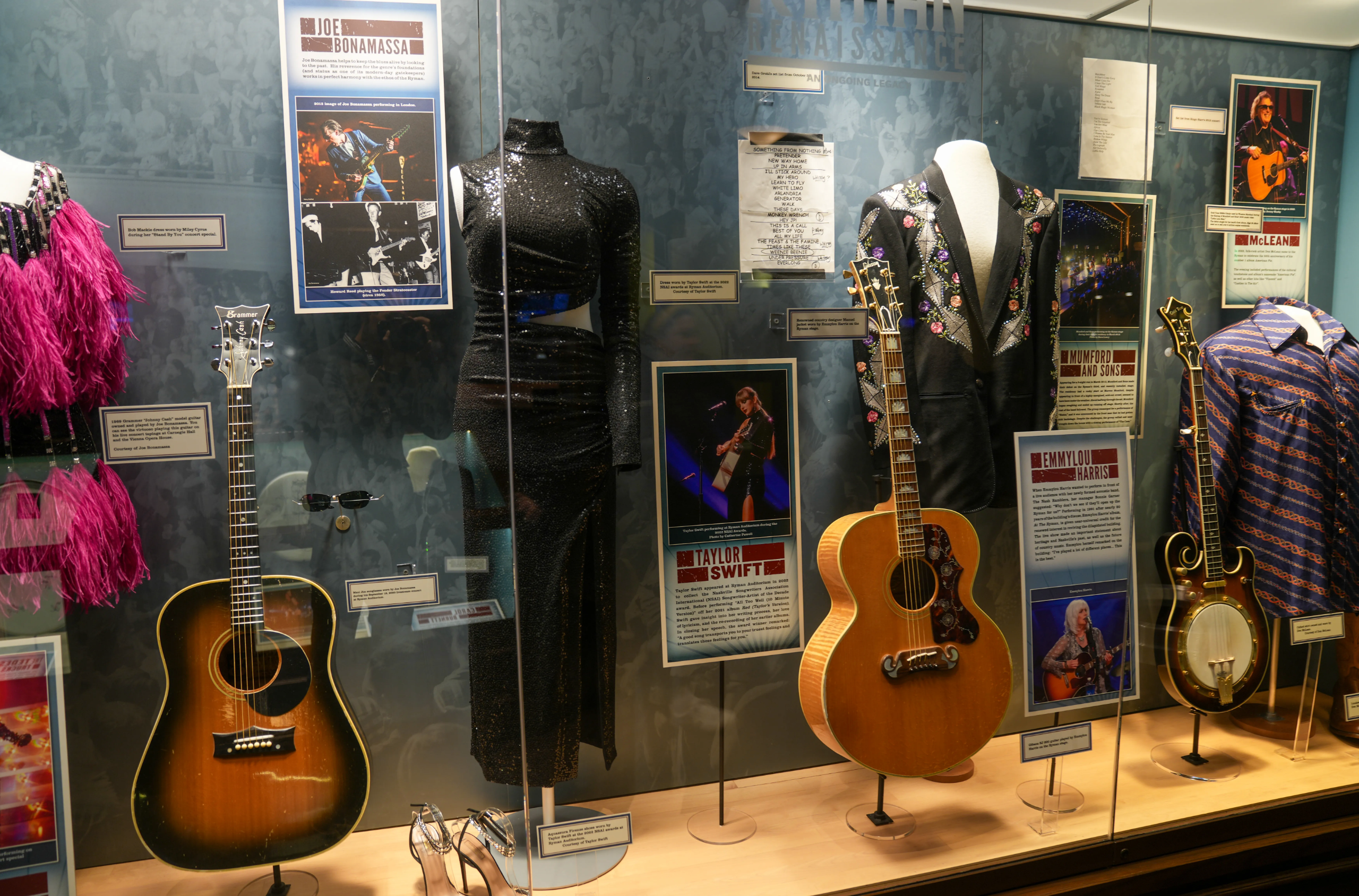 Ryman tour display containing Taylor Swift's black dress. 